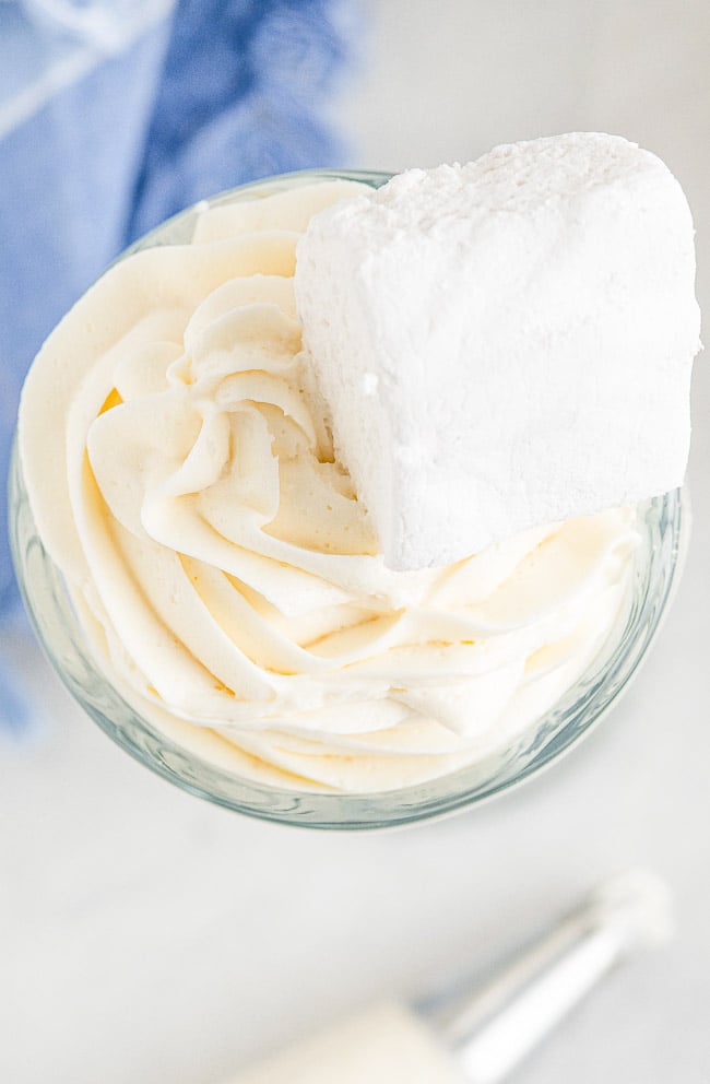 Marshmallow Buttercream Frosting – A five-minute decadent frosting recipe made with just five ingredients! Rich, sweet, smooth, perfect for piping or just spreading on your favorite cake, cupcakes, brownies, and more! So EASY yet so good!