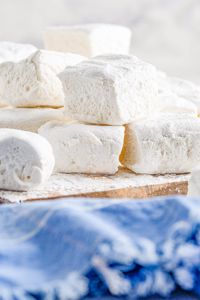 Homemade Marshmallows - Easier than you think to make and the results are so WORTH IT! Chewy, sticky, bouncy, soft yet firm, and they blow store bought marshmallows away! Learn how to make marshmallows at home with my straightforward and simple recipe! 