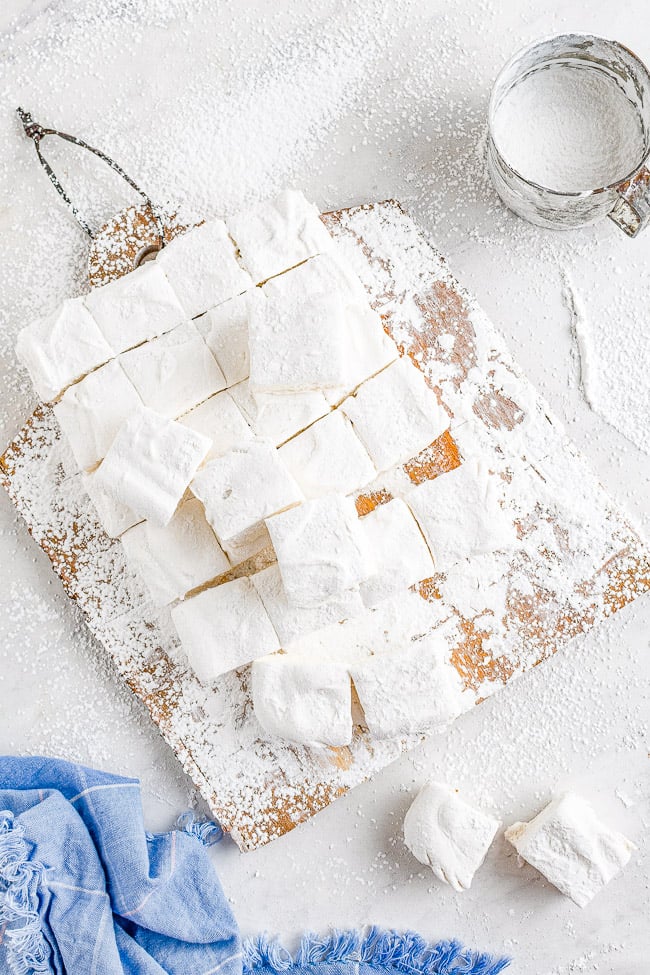 Homemade Marshmallows - Easier than you think to make and the results are so WORTH IT! Chewy, sticky, bouncy, soft yet firm, and they blow store bought marshmallows away! Learn how to make marshmallows at home with my straightforward and simple recipe! 
