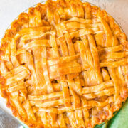 Best Homemade Apple Pie - This fabulous apple pie is a specialty of my grandma's. The sauce for the apples is slowly poured over the lattice crust until it fills the shell.  When it bakes, the top has a nice crispy coating over the flaky crust. The center is full of sweet and tart tender apples with just the right amount of cinnamon and sugar. This really is the BEST apple pie!