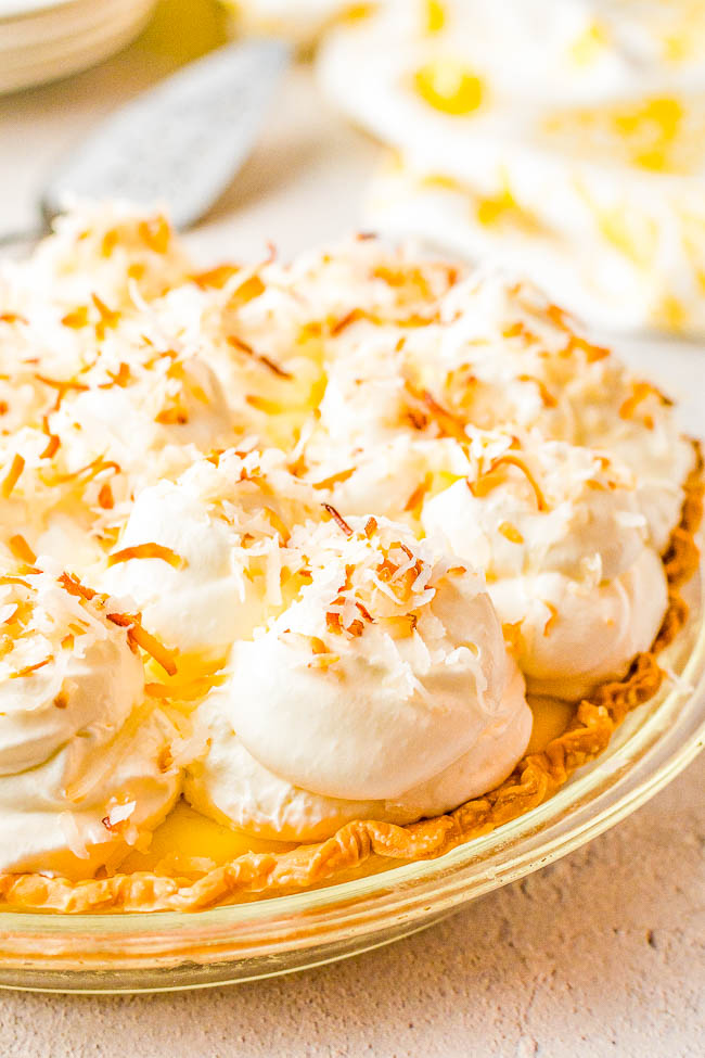 Coconut Cream Pie – Homemade coconut cream pie that will become a family FAVORITE! There’s a luscious coconut filling, a creamy top, and this EASY from-scratch pie is loaded with coconut flavor because coconut is used four different ways! Use store bought crust to save time!