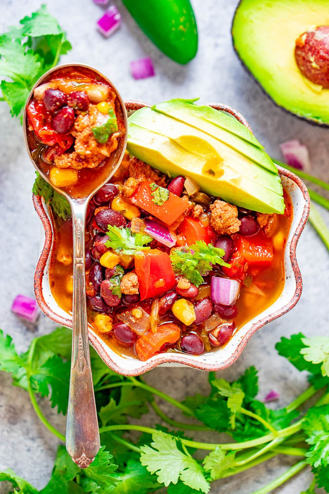 Easy 30-Minute Taco Soup - Taco lovers are going to love this beef taco soup which is like eating tacos but in soup form! Layers of Mexican-inspired flavors in this comforting and hearty yet healthy soup that will become a family FAVORITE! Fast, easy, one pot, and perfect for busy weeknights!