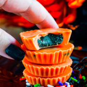 Halloween Peanut Butter Cups - Learn how to make peanut butter cups with this EASY FIVE INGREDIENT RECIPE! With festive Halloween colors, they're sure to be a hit with everyone from kids to adults alike! They keep perfectly for weeks so feel free to make them in advance and pass them out at your Halloween parties and festivities!