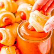 Cheddar Pigs In A Blanket - Sliced cheddar cheese and flaked salt takes this classic game day recipe and turns up the flavor! A FAST and EASY appetizer for holiday parties, get-togethers, or events! Along with the easy whisk-together dipping sauce, I promise you there won't be any left over!