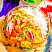A bowl of Thai pumpkin curry with chickpeas.