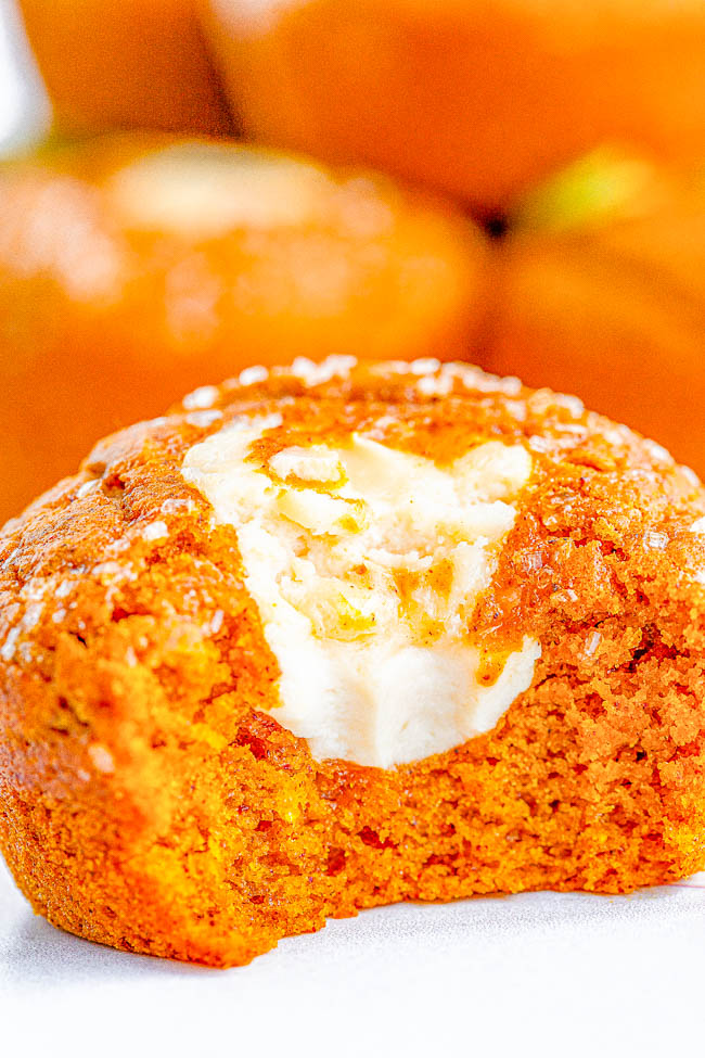 Starbucks Copycat Pumpkin Cream Cheese Muffins - Easy recipe for copycat pumpkin cream cheese muffins that are even BETTER than Starbucks! Super soft, moist, brimming with pumpkin spice flavor, and filled with tangy-sweet cream cheese! You are going to LOVE being able to replicate the coffee shop fall favorite at home in no time! 