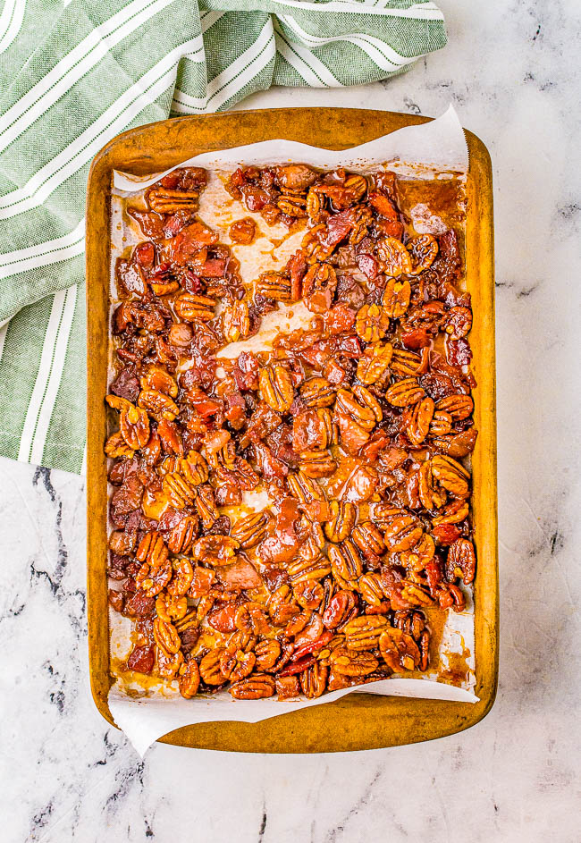 Savory Sweet Potato Casserole with Candied Bacon - If you thought sweet potato casserole couldn't get any better, wait until you taste it topped with candied bacon and pecans! The sweet potatoes are smooth and creamy and the candied bacon topping is the perfect texture and flavor contrast! A WONDERFUL family-favorite side dish for Thanksgiving, Christmas, holiday parties and events that's easy to prepare with make-ahead directions! 