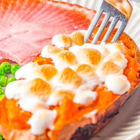 Twice Baked Marshmallow Sweet Potatoes - Sweet, creamy, decadent, and reminiscent of sweet potato casserole but individually portioned! FAST and EASY enough for family dinners or make them for more formal holiday celebrations! Either way, these are always the PERFECT comfort food side dish that everyone devours!