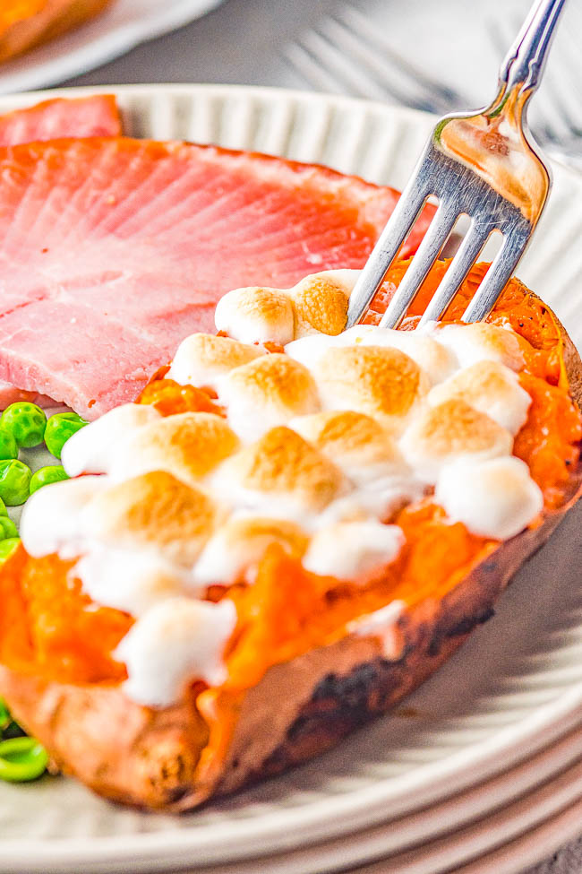 Twice Baked Marshmallow Sweet Potatoes - Sweet, creamy, decadent, and reminiscent of sweet potato casserole but individually portioned! FAST and EASY enough for family dinners or make them for more formal holiday celebrations! Either way, these are always the PERFECT comfort food side dish that everyone devours!