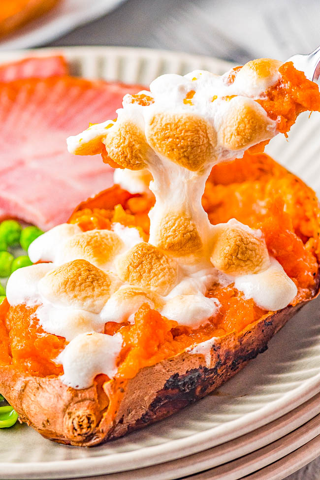 Twice Baked Sweet Potatoes with Marshmallows — Sweet, creamy, decadent, and reminiscent of sweet potato casserole but individually portioned! FAST and EASY enough for family dinners or make them for more formal holiday celebrations! Either way, these are always the PERFECT comfort food side dish that everyone devours!