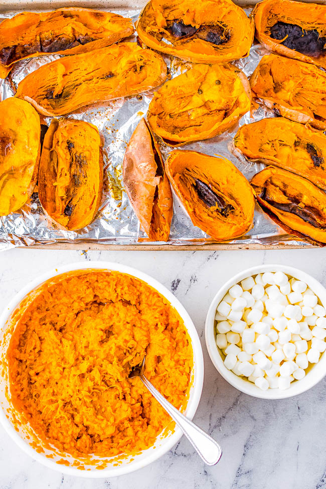 Twice Baked Sweet Potatoes with Marshmallows — Sweet, creamy, decadent, and reminiscent of sweet potato casserole but individually portioned! FAST and EASY enough for family dinners or make them for more formal holiday celebrations! Either way, these are always the PERFECT comfort food side dish that everyone devours!