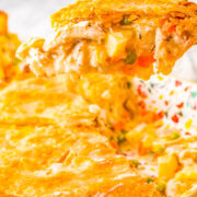 Turkey Pot Pie - Hearty, creamy, comforting, perfect for chilly weather, and EASY to make! Use leftover shredded TURKEY OR CHICKEN in this homemade pot pie recipe loaded with potatoes, carrots, celery, peas, and juicy chunks of meat. Use store bought refrigerated pie crust and a shredded rotisserie chicken to save even more time!