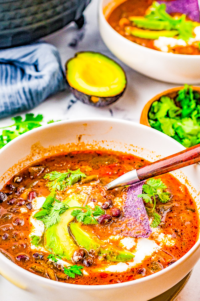 Easy Black Bean Soup – Smoky, savory black bean soup with roasted poblano peppers and an array of spices for layers of rich flavor! Hearty, comforting, and naturally vegan and gluten-free, this soup makes a great HEALTHY meal or robust starter or side!