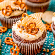 Kitchen Sink Cupcakes – Rich and decadent chocolate cupcakes topped with everything but the kitchen sink including pretzels, potato chips, toffee bits, and chocolate chips! FAST and EASY cupcakes to make because they use a chocolate cake mix base to save you time!