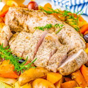 Slow Cooker Pork Loin - Tender, juicy pork loin is slow cooked with hearty vegetables for a complete and EASY meal! Reminiscent of a hearty and rustic recipe, yet fancy enough for a special dinner or holiday entertaining!