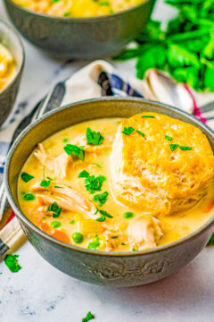 Chicken Pot Pie Soup - All the comfort food feels of pot pie, but in soup form! Rich, hearty, creamy and ready in just 30 minutes! Use canned biscuit dough to save time on busy weeknights when you're craving a hot homemade meal!