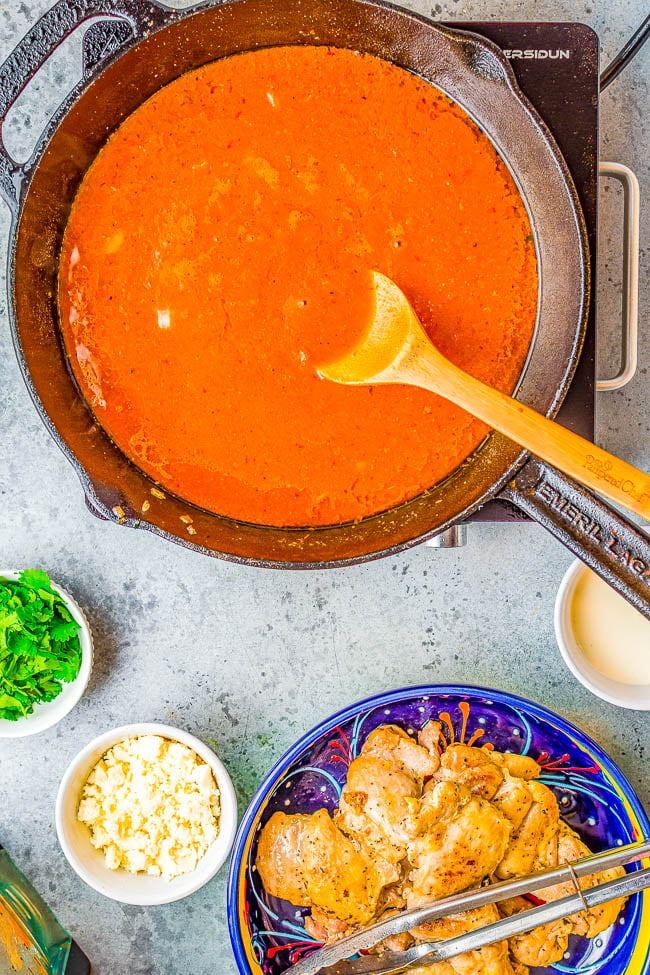 Creamy Chipotle Chicken — When you're in the mood for rich layers of flavor from chipotle sauce and roasted garlic-infused olive oil, this EASY skillet chicken recipe is PERFECT! There's lots of creamy chipotle sauce that's just begging to be sopped up in this family favorite Mexican-inspired recipe!