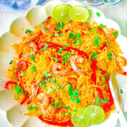 Instant Pot Shrimp Paella - All the rich flavors of classic Spanish paella but made in your Instant Pot and ready in 25 minutes! Plump and juicy shrimp, crisp-tender bell peppers and peas, all tossed in saffron and paprika seasoned rice! An EASY recipe that's perfect for busy weeknights!