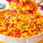 Instant Pot Chili Mac and Cheese - Hearty chili mac made with ground beef, onions, tomatoes, kidney beans, and two types of melted CHEESE! EASY, ready in 20 minutes, and a cheesy comfort food family favorite that's perfect for busy weeknights! Stovetop directions provided if you don't have an Instant Pot. 