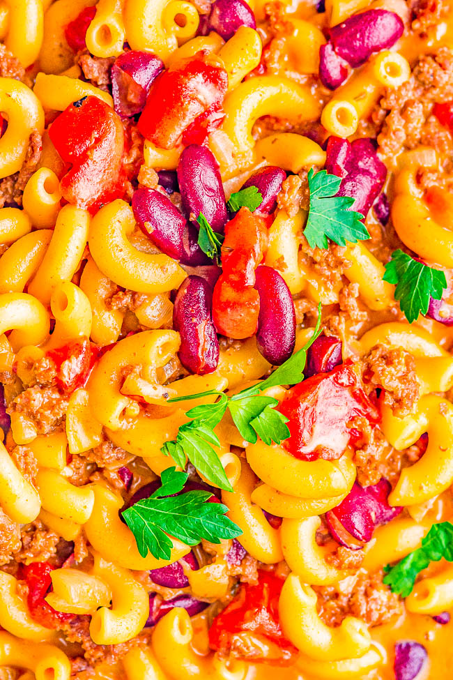 Instant Pot Chili Mac and Cheese - Hearty chili mac made with ground beef, onions, tomatoes, kidney beans, and two types of melted CHEESE! EASY, ready in 20 minutes, and a cheesy comfort food family favorite that's perfect for busy weeknights! Stovetop directions provided if you don't have an Instant Pot. 