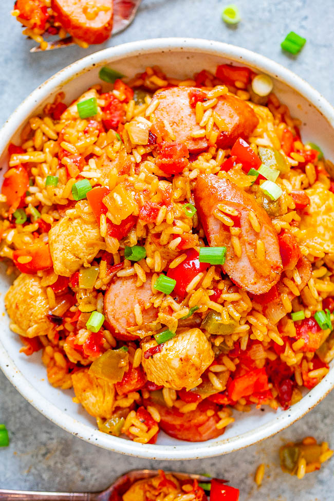 Easy One-Pot Chicken and Sausage Jambalaya — This EASY jambalaya is made in ONE pot with Cajun-seasoned chicken, sausage, rice, peppers, and more! The whole family will LOVE this big batch of comfort food that's ready in 30 MINUTES!