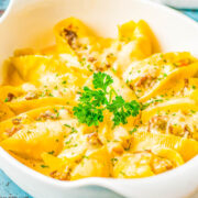 Philly Cheesesteak Stuffed Shells - Comfort food coming in hot with these Philly cheesesteak stuffed pasta shells complete with ribeye steak, peppers, and onions. Ricotta, provolone, and Parmesan cheese lend a SUPER cheesy touch and everything is smothered in Alfredo sauce for next-level deliciousness!
