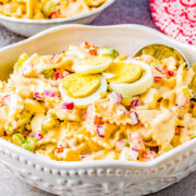 Amish Pasta Salad - A family-favorite classic pasta salad recipe with al dente pasta, bell peppers, celery, red onions, and hard-boiled eggs tossed in a creamy tangy-sweet dressing! Perfect for picnics, potlucks, backyard parties, and events! Everyone will go back for a second helping of this comforting side salad! 
