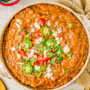 Instant Pot Refried Beans - Learn how to make perfect beans in your Instant Pot in a fraction of the time it takes on the stove or in a slow cooker. So much EASIER, FASTER, and more FLAVORFUL! Mash them up for the best refried beans you can ask for! So versatile and can be used in a ton of other recipes! 