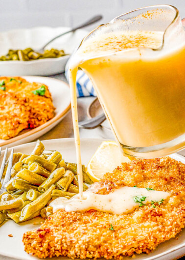 Beurre Blanc Sauce – Learn how to make this buttery white wine sauce with hints of lemon and shallots and impress your friends and family! Beurre blanc sauce is delicious served over chicken, fish, seafood, and vegetables. It elevates any ordinary dish to the next level and makes it taste elegant and fancy!