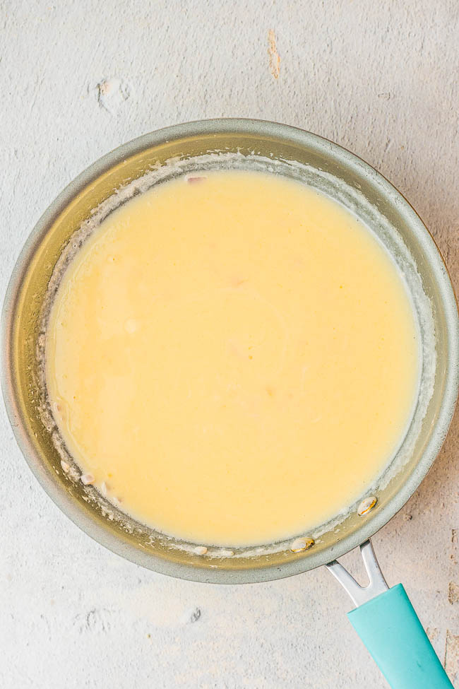 Beurre Blanc Sauce - Learn how to make this buttery white wine sauce with hints of lemon and shallots and impress your friends and family! Beurre blanc sauce is delicious served over chicken, fish, seafood, and vegetables. It elevates any ordinary dish to the next level and makes it taste elegant and fancy! 
