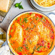 Creamy Tuscan chicken in a pot.