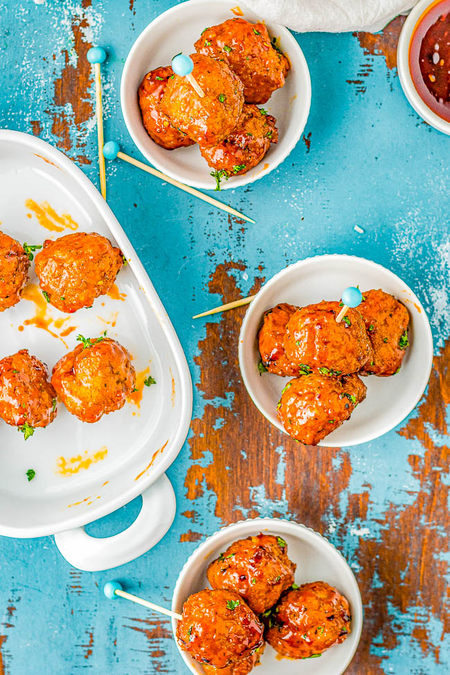 Air Fryer Firecracker Chicken Meatballs - Lightly crisped on the outside, juicy and tender on the inside, these homemade meatballs are air fried and then coated in a sweet-with-tangy-heat firecracker sauce with the perfect amount of heat! Serve these as an appetizer or as the main course. They're perfect for parties and events, too! Oven baking instructions provided as well as for how to make them using frozen meatballs.