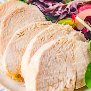 Sliced poached chicken breast slices.