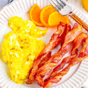 Air Fryer Twisted Bacon - Every bite of this twisted bacon is lightly crisped on the outside while being tender, juicy, and delicious on the inside! Learn how to make this TikTok trend-inspired bacon in your air fryer. FAST, EASY, and so crave-worthy! Oven baking instructions also provided.