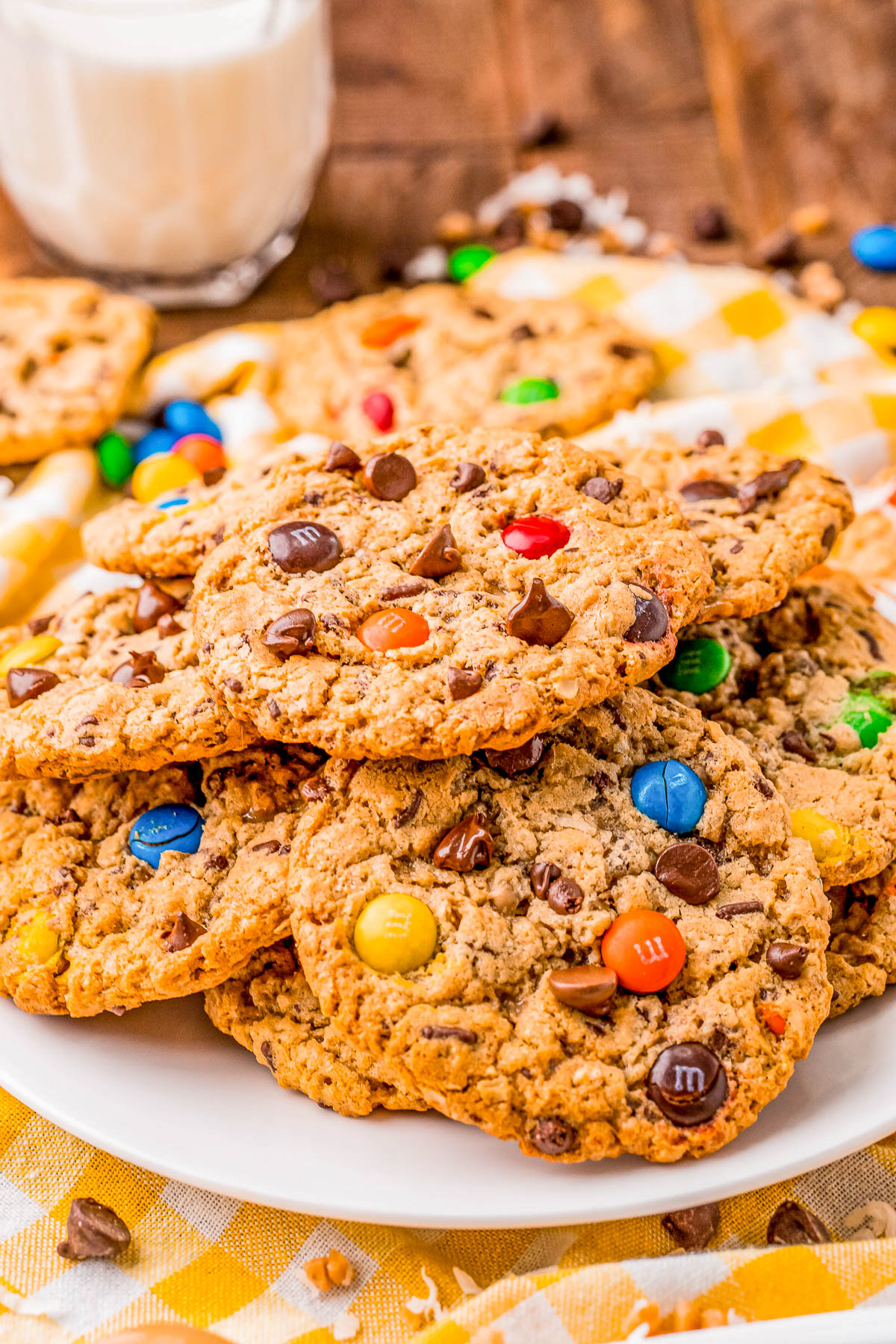 Monster Cookies - My recipe for classic monster cookies that are chock full of creamy peanut butter, oats, chocolate chips, and M&M's makes both kids and adults reach for just one more cookie! Fast, EASY, soft, perfectly chewy, and they'll become a family FAVORITE in no time! 