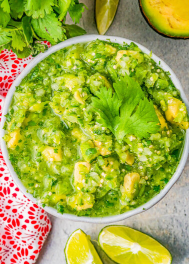 Chunky Tomatillo Avocado Salsa - If you like salsa verde you're going to LOVE this homemade version that includes creamy chunks of avocado! As FAST and EASY and tossing a handful of healthy ingredients into your food processor and the salsa is ready in seconds. No roasting or charring necessary for AMAZING homemade salsa! 