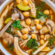 A bowl of chicken and chickpea salad.