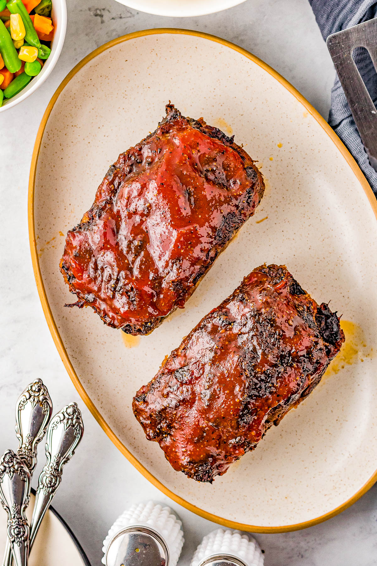 Cracker Barrel Meatloaf - This Cracker Barrel meatloaf copycat is tender, juicy, made with the restaurant's secret ingredients, glazed to tangy-sweet perfection, and sure to become a family FAVORITE comfort food dinner recipe! Air fryer AND oven baking options provided.