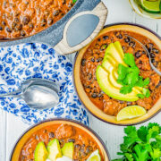 Triple Pork Black Bean Chili - Three types of pork including bacon, pork roast, and chorizo plus black beans and more in this comforting, hearty, and filling chili recipe! Easy and perfect for chilly weather, family dinners, or make it for game day or tailgating parties! 