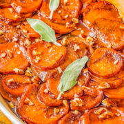Candied Yams - Learn how to make the BEST candied yams which are baked in the most wonderful buttery cinnamon-and-sugar sauce! If you're looking for an EASY Thanksgiving or Christmas side dish recipe, look no further than this EASY holiday recipe with almost no active prep time. Truly candy-like in how sweet and wonderful they are. Sure to become a guaranteed family favorite!