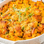 Cornbread Stuffing in a white oval casserole dish.