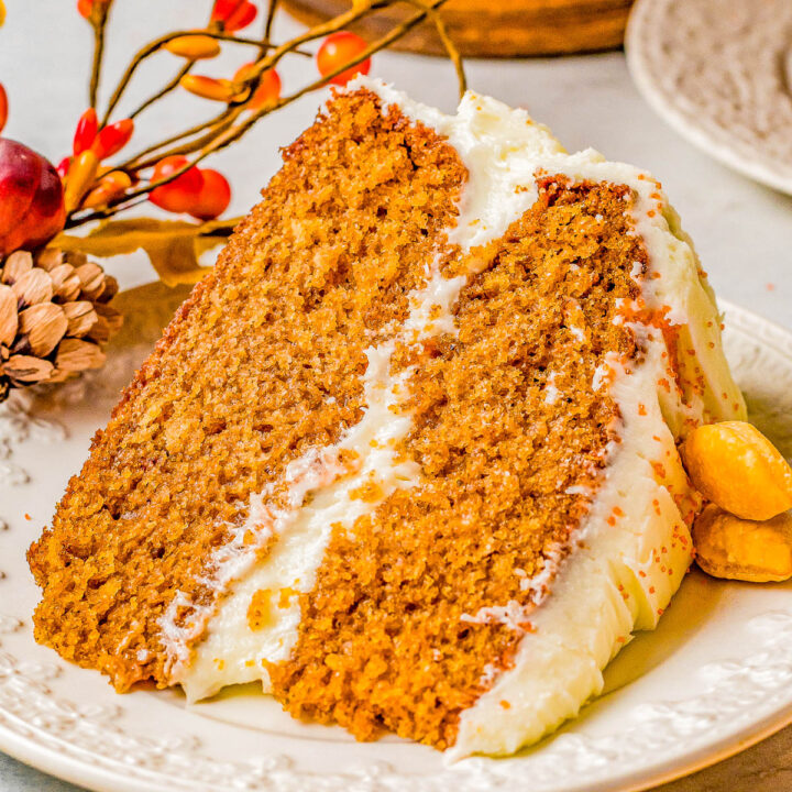Spice Cake with Cream Cheese Frosting – Celebrate the cozy flavors of the fall and winter holiday season with this soft, moist, and richly spiced layer cake! Complete with scrumptious homemade cream cheese frosting, this classic spice cake is what holiday dessert dreams are made of! Serve it as your Thanksgiving or Christmas dessert centerpiece and your family will ask for it every year!