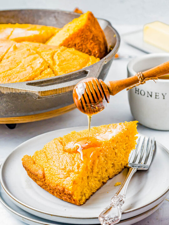 Sweet Potato Cornbread - Homemade cornbread just got better because it's jazzed up with mashed sweet potatoes, brown sugar, and pumpkin pie spice! Thanks to the natural moisture from sweet potatoes and the addition of buttermilk, it's so moist and flavorful! Whether you're looking for a fall-inspired comfort food recipe or a new Thanksgiving or Christmas side dish, this cornbread is EASY and will become a new family FAVORITE!