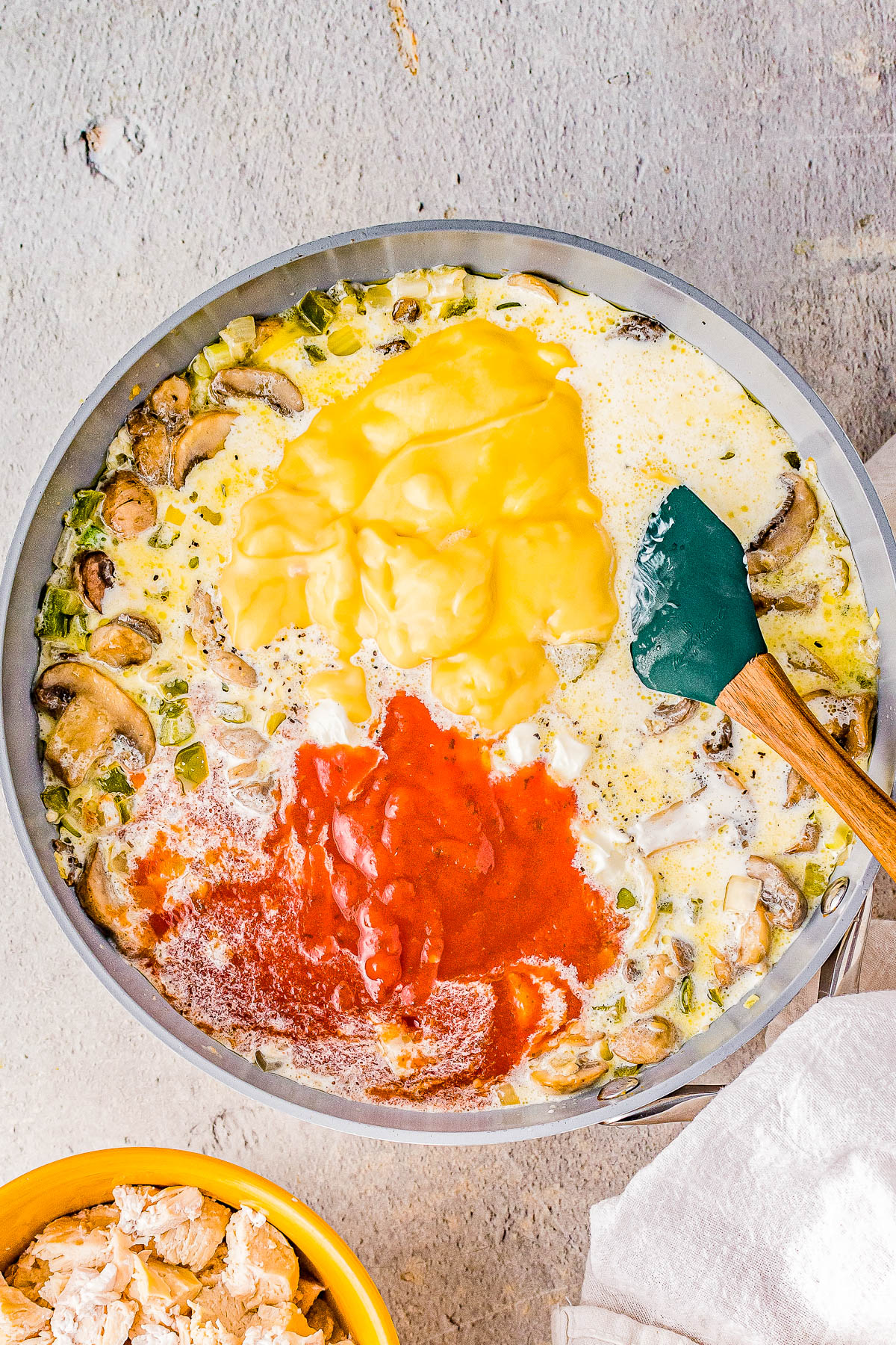 Turkey Tetrazzini - Wondering what to do with your leftover Thanksgiving turkey? This rich casserole features al dente spaghetti, a decadent cream sauce, tender vegetables, cheese, and of course your extra turkey! It's EASY to make and may be even better than your Thanksgiving feast! You can also sub leftover chicken or rotisserie chicken!