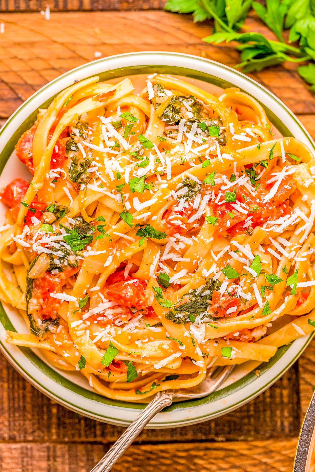 Pasta with Vodka Sauce - Make an Italian restaurant-worthy pasta dish EASILY at home in 30 minutes! Pasta is tossed in a tomato-forward sauce that includes red pepper flakes, onions, garlic, spinach, heavy cream for RICHNESS and of course, vodka! A family FAVORITE comfort food classic recipe that's doable for busy weeknights, for entertaining, or for date night at home!