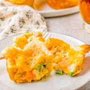 Mini Chicken Pot Pies with Crescent Roll Crust - A FAST and EASY family-favorite recipe that uses just 5 main ingredients! Great for busy weeknights, game day parties and events! No one can resist the creamy filling with juicy chicken and lots of melted cheese! 