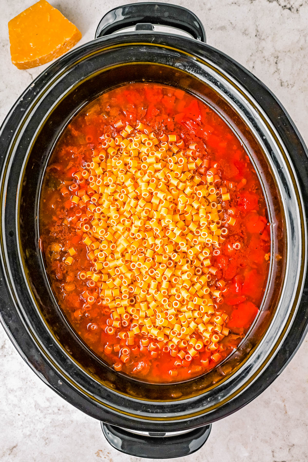 Slow Cooker Pasta e Fagioli Soup (Olive Garden Copycat) - My homemade recipe for this famous soup is even BETTER than the restaurant version and SO EASY thanks to your Crock-Pot! Complete with ground beef (or sausage), vegetables, spices, and pasta. Hearty comfort food that'll become a family FAVORITE in no time! Stovetop cooking directions also provided.