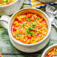 30-Minute Homemade Alphabet Soup - Tender alphabet pasta in a tomato flavored broth with a variety of vegetables including carrots, corn, peas, and green beans. So much BETTER than the canned store bought alternatives that many of us grew up with! A one pot EASY recipe that's perfect for busy weeknights!