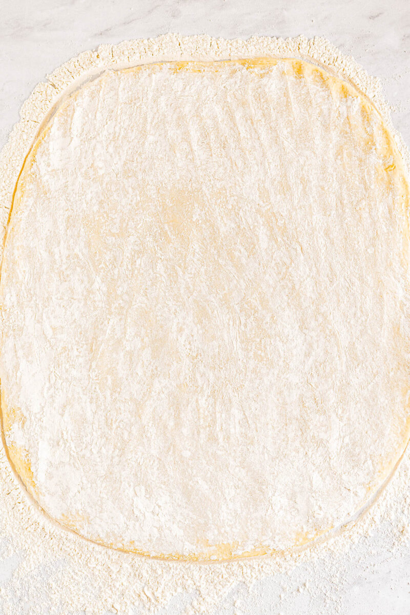 Texas Roadhouse Roll dough spread in a rectangle.