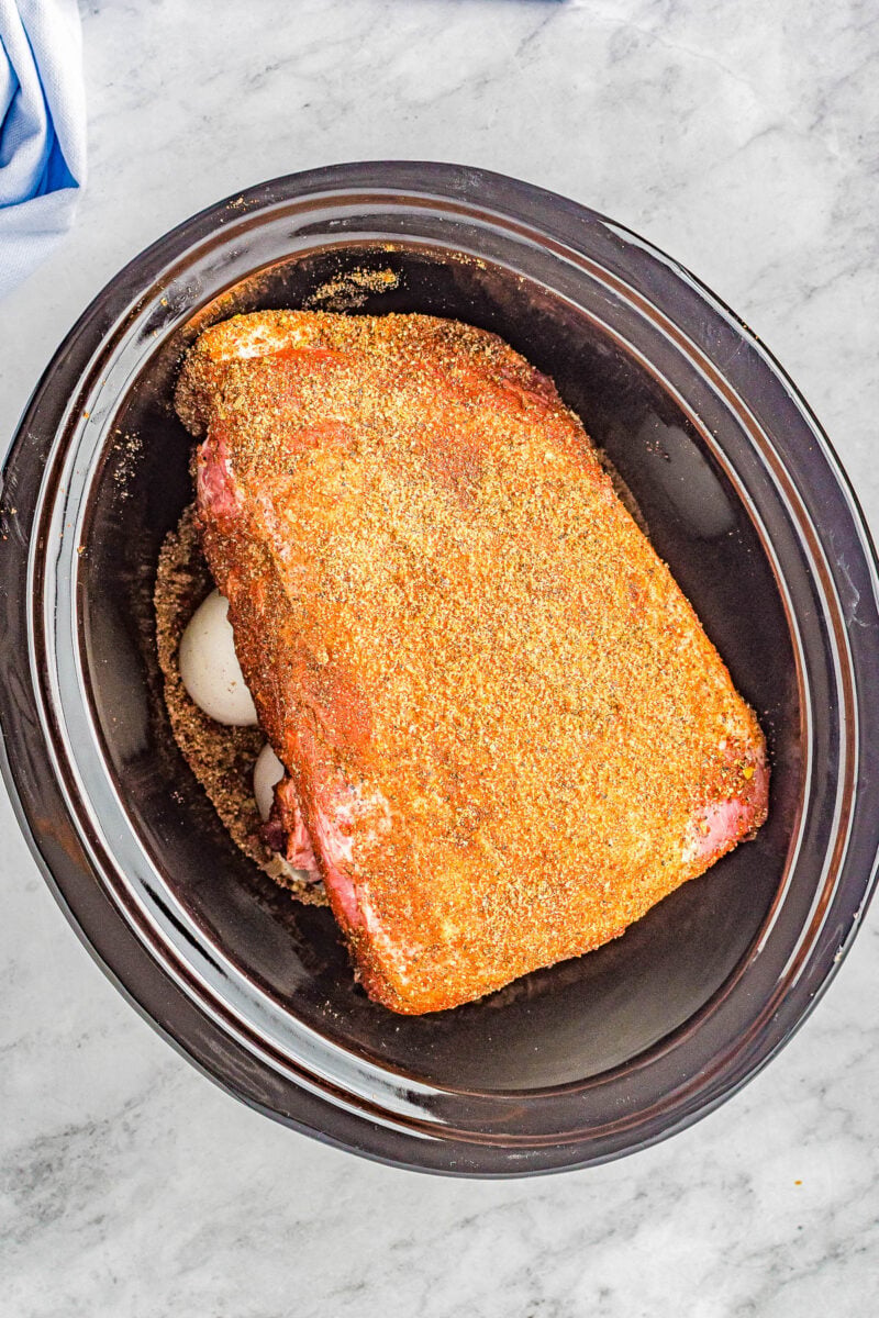 Slow Cooker Pulled Pork - The EASIEST recipe for pulled pork because your Crock-Pot does all the work for you! Set it and forget it for this AMAZING pulled pork that's super flavorful and so tender and juicy! Great for pulled pork sandwiches and tacos!
